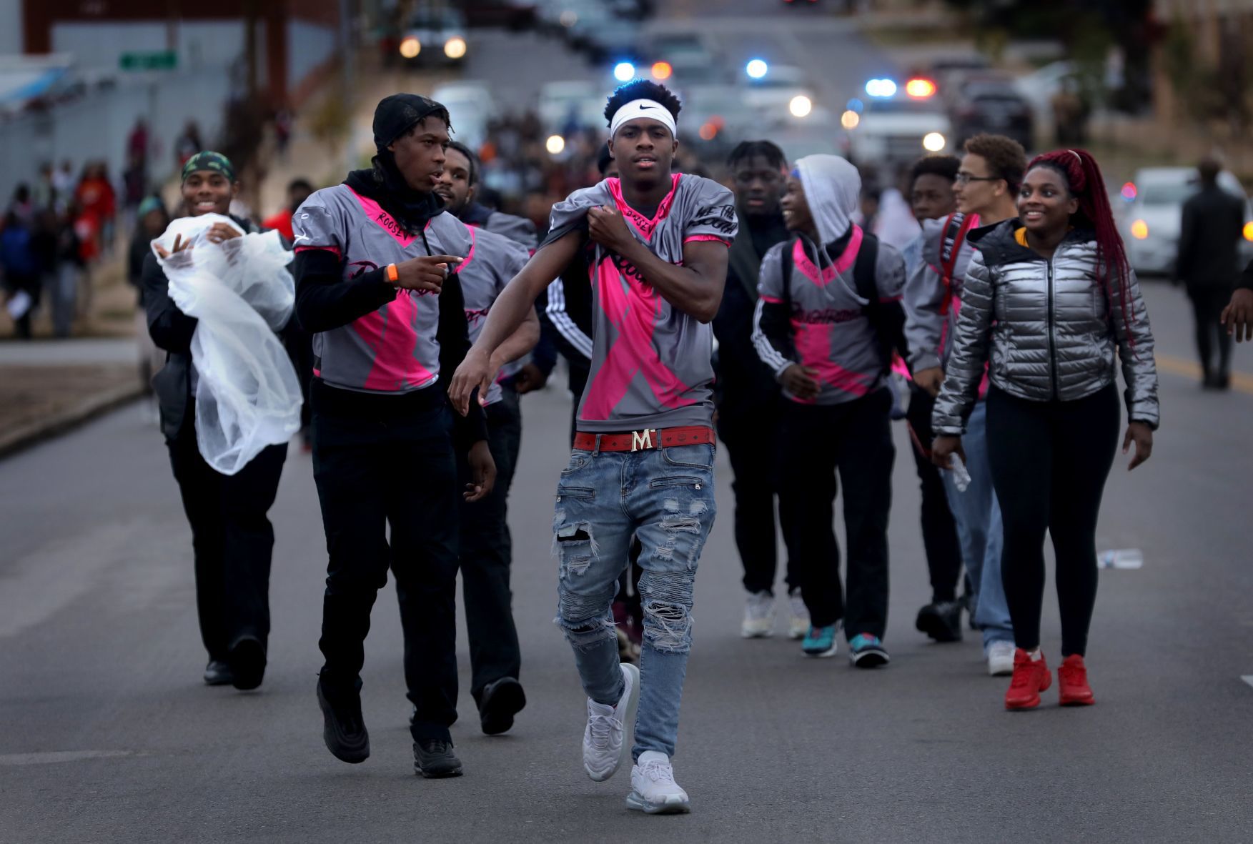 Roosevelt High School students walk out of school and march to protest firing of football coach Trey Porter.
